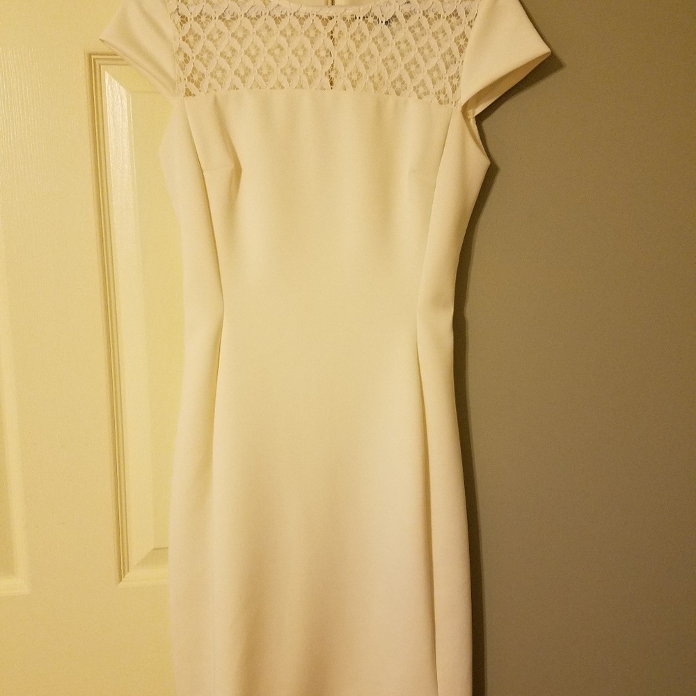 Antonio Melanie cream dress with lace.